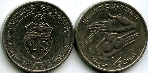 Монета 1/2 динара 2013г Тунис